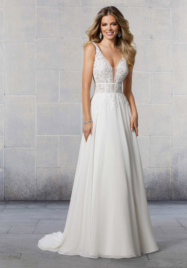 Model wears the Shiloh wedding gown by Morilee
