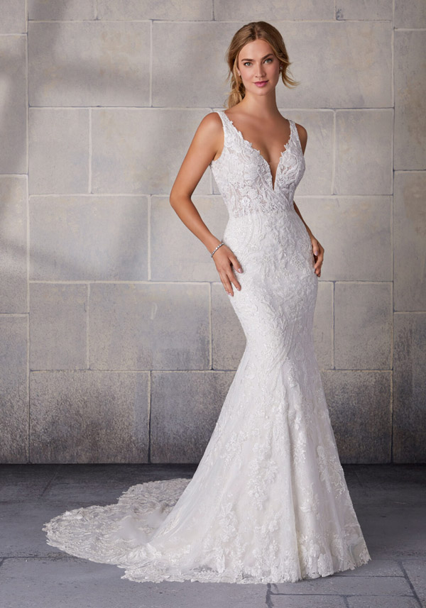 Model wears the Stefani wedding gown by Morilee
