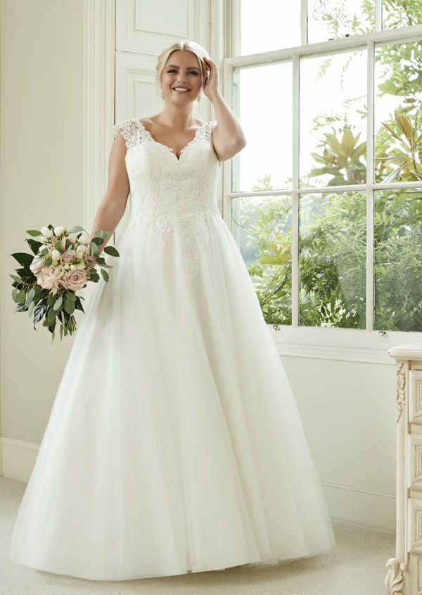 Model wears the Sarah Jane wedding gown by Romantica Of Devon