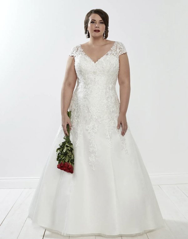 Model wears the Venus wedding gown by Romantica of Devon
