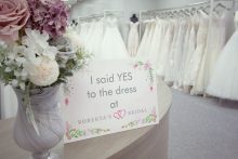 Flowers and "I said yes to the dress" sign inside Roberta's Bridal in Burslem, Stoke-on-Trent
