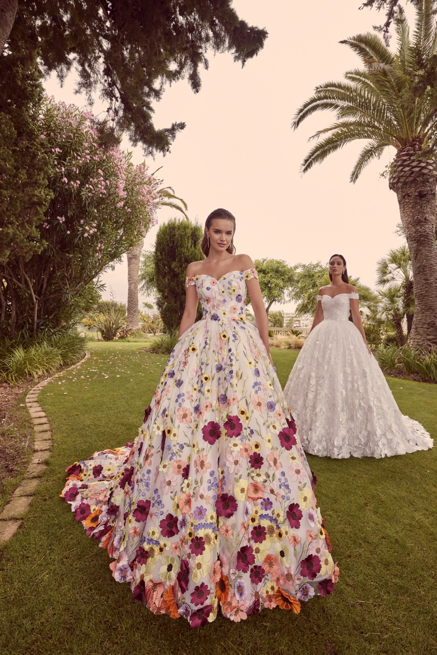 Model wears Ronald Joyce floral wedding dress