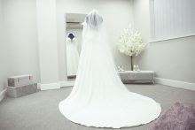 Wedding dresses on display in Bridal Dressing Room at Roberta's Bridal in Burslem, Stoke-on-Trent