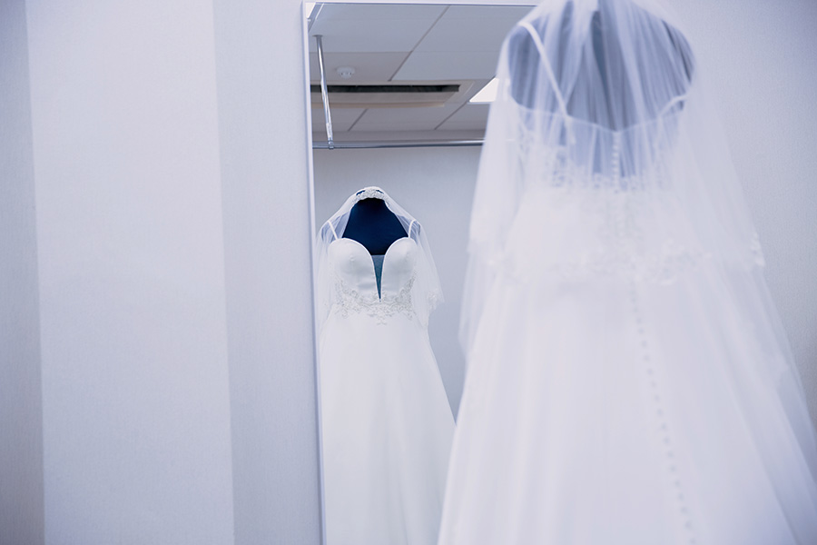 Reflection of a wedding dresses on display at Roberta's Bridal in Burslem, Stoke-on-Trent