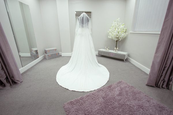 Wedding dresse and veil on display at Roberta's Bridal in Burslem, Stoke-on-Trent