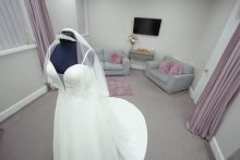 Wedding dress on a mannequin in the Bridal Dressing room at Roberta's Bridal in Burslem, Stoke-on-Trent